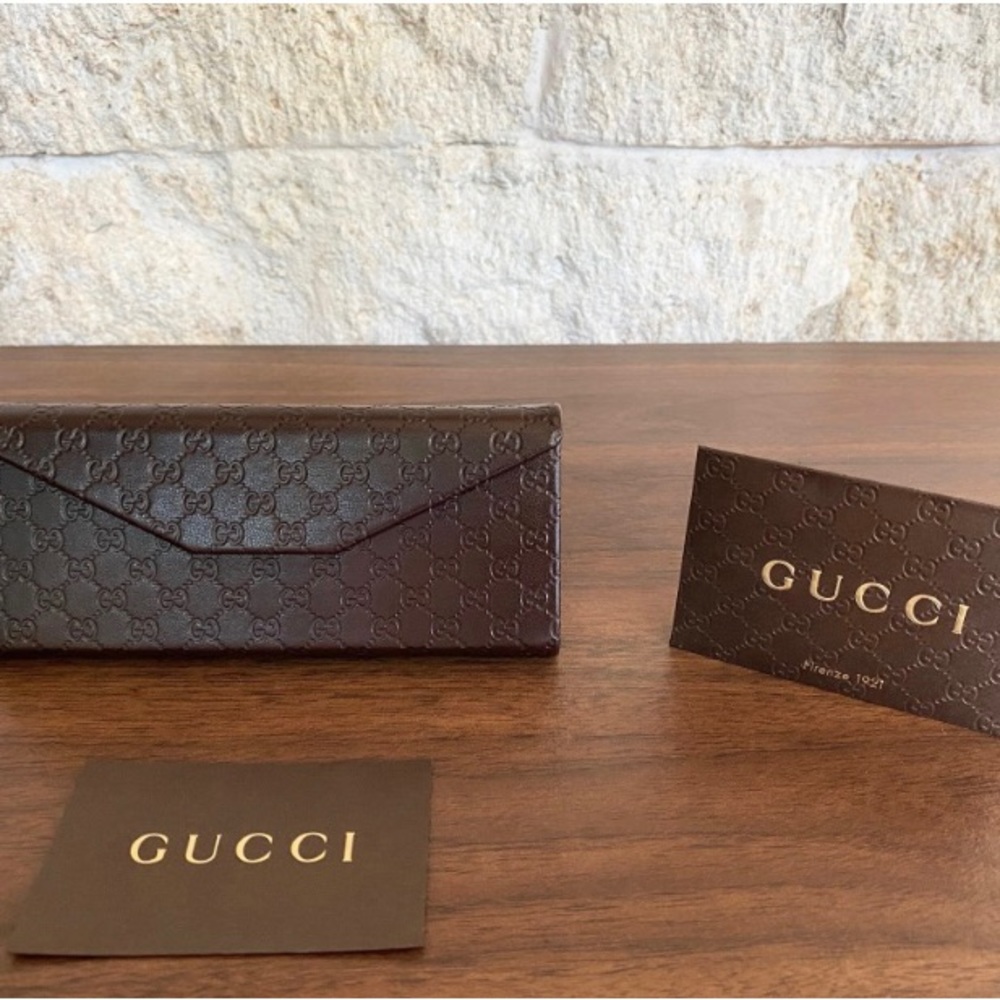 Authentic Gucci sunglasses with leather trifold case like new condition brown